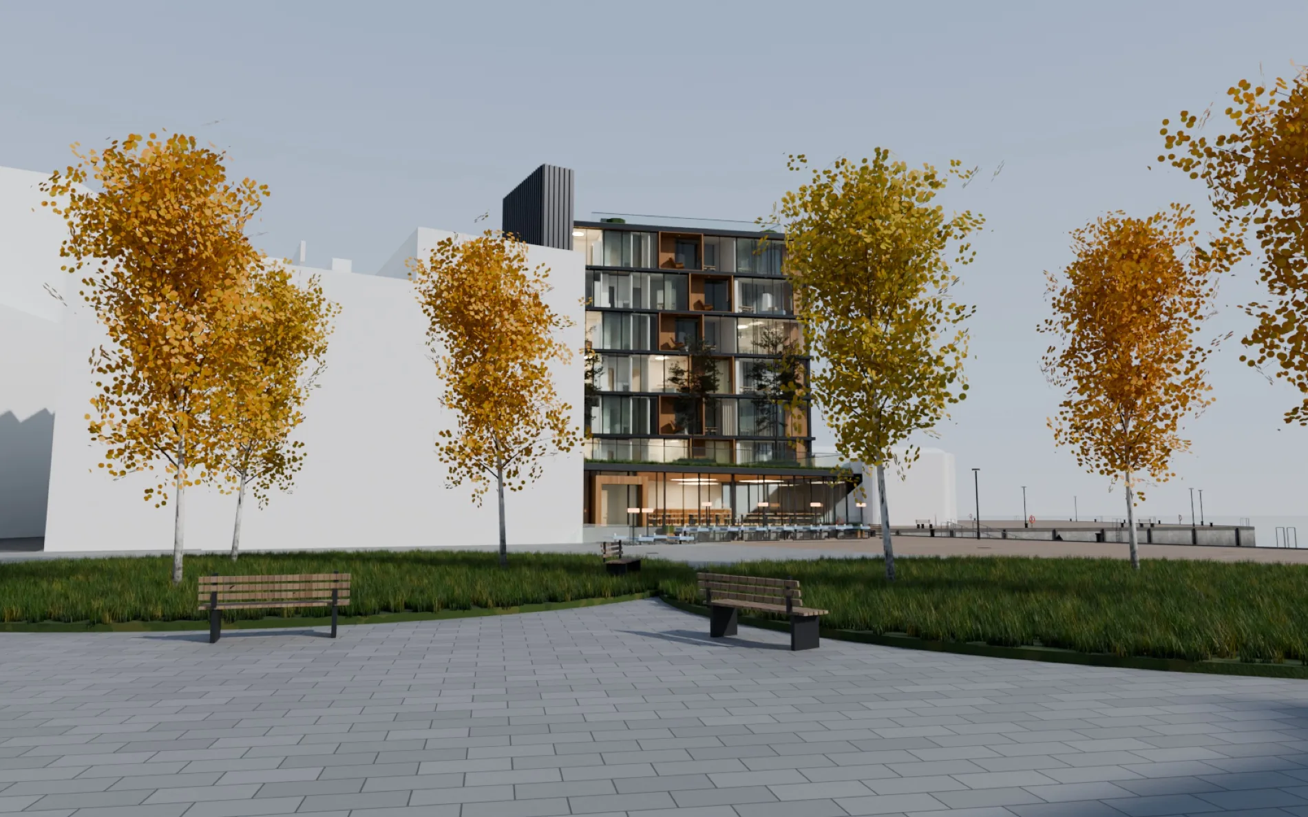 Bukta nord med det nye bygget, torget med bjørk